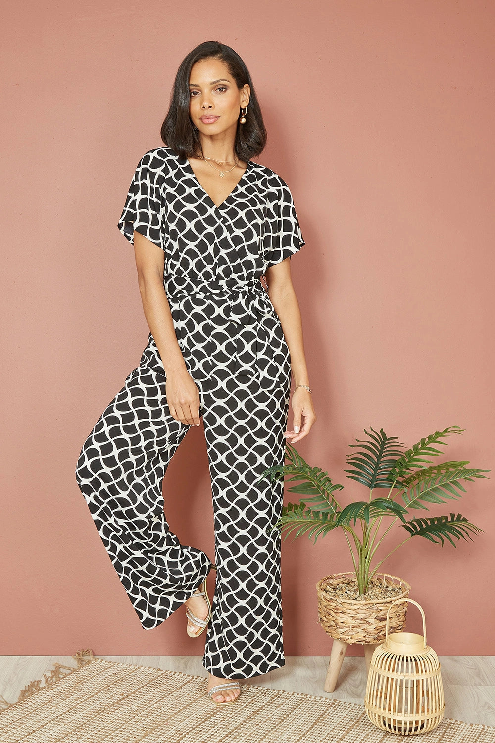 Yumi Black Geometric Print Wrap Jumpsuit Yumi