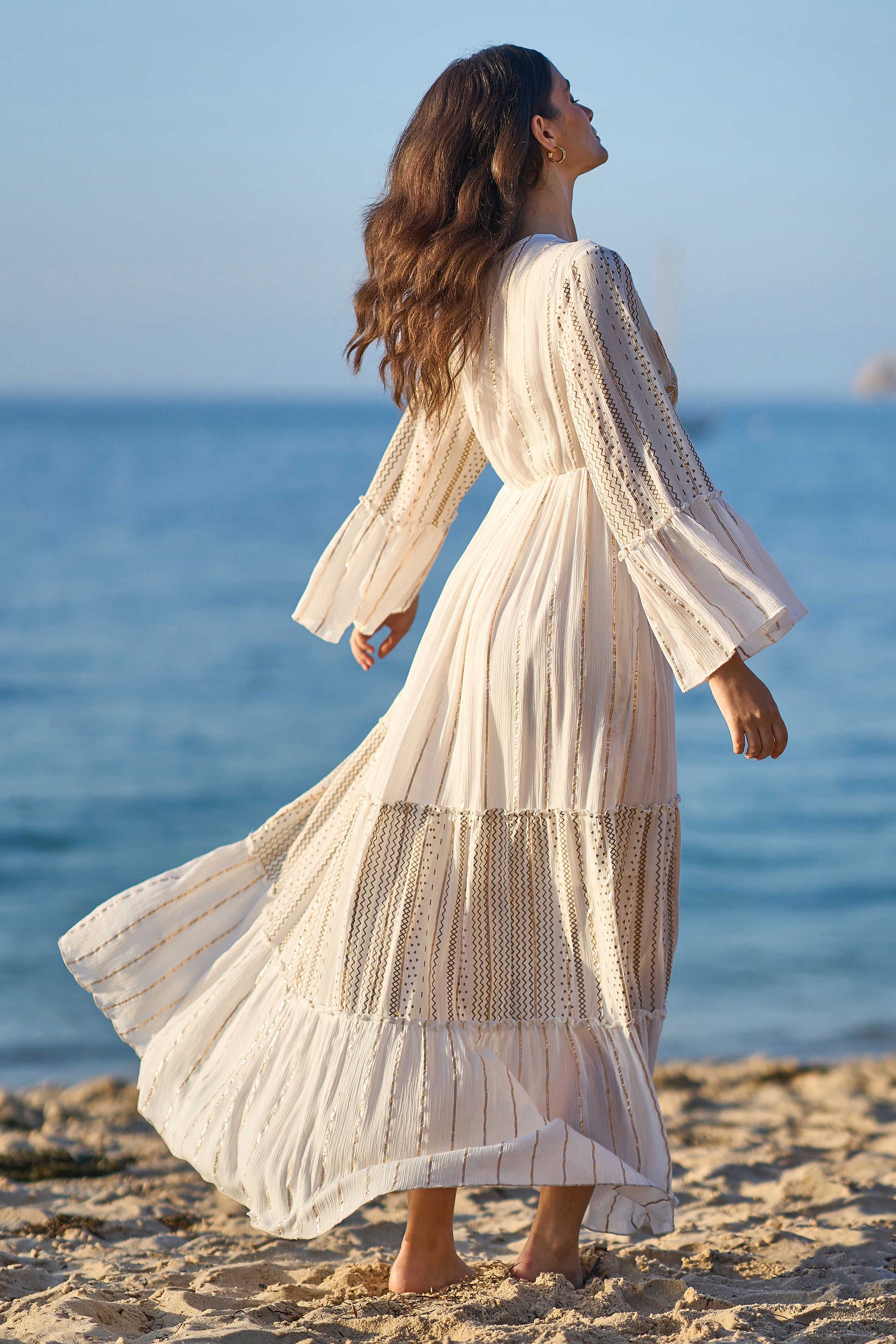 Yumi White Metallic Embellished Maxi Dress With Long Sleeves Yumi White Metallic Embellished Maxi Dress With Long Sleeves
